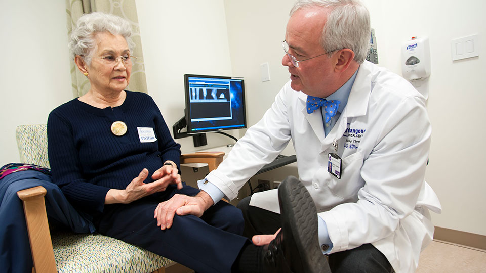 Dr. Justin G. Lamont with Patient