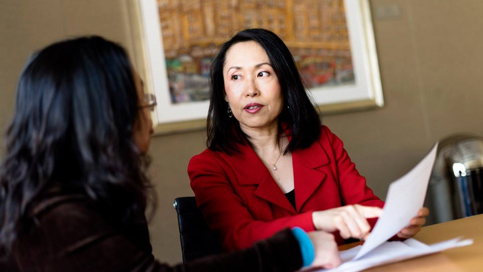 Social Worker Talks to Patient