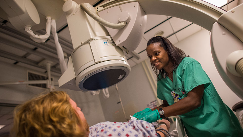 X-ray Technician with Patient
